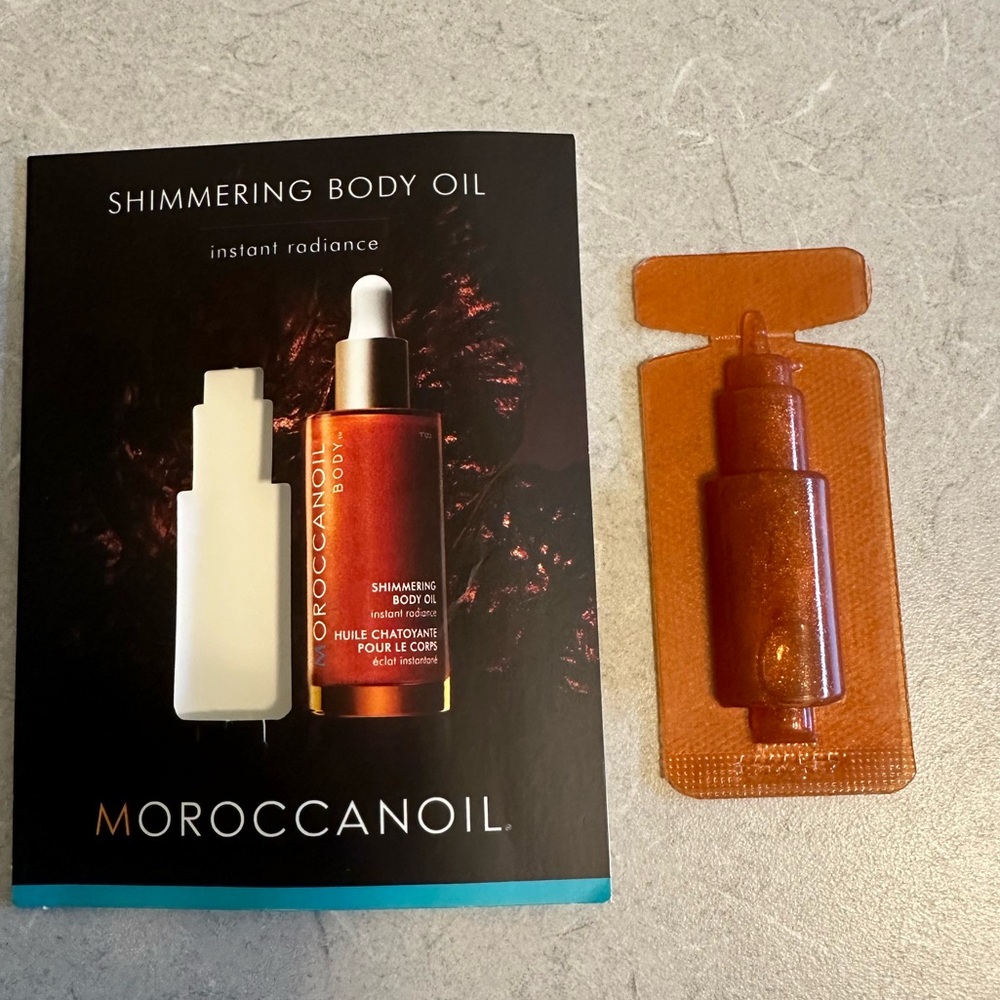Sample, brand new. Moroccanoil shimmer body oil.